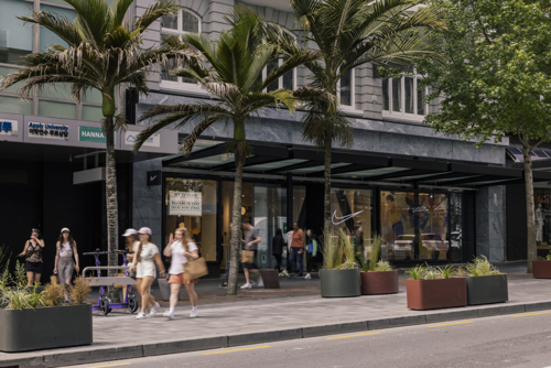 Girls walking down Queen Street